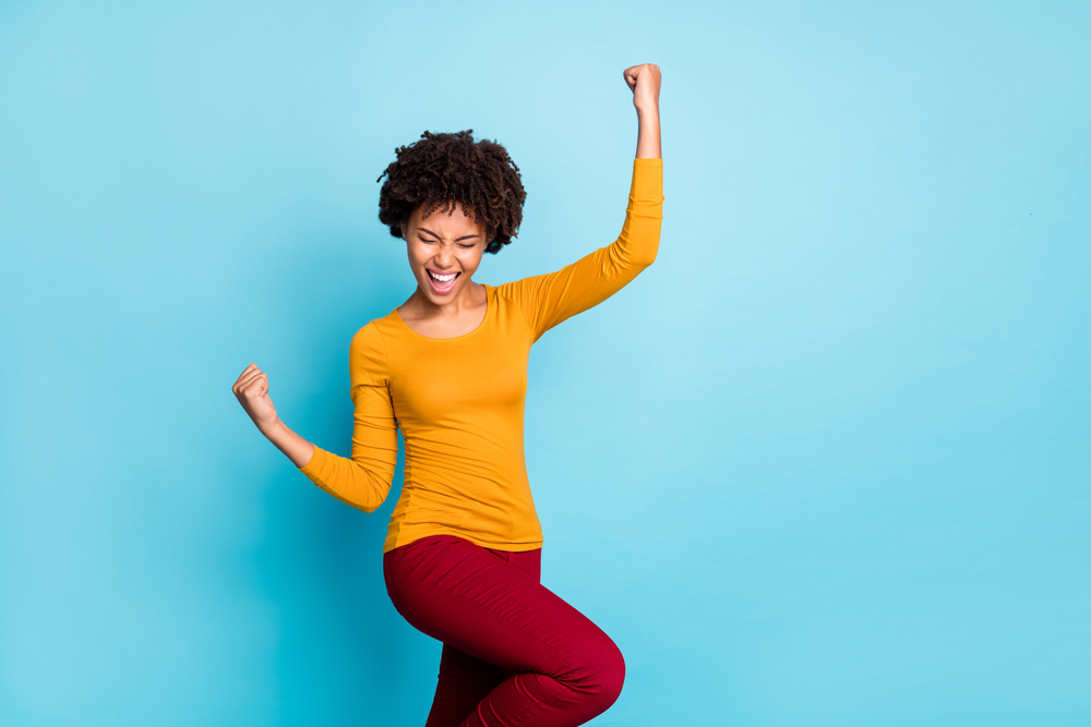 Home portrait,of,crazy,delighted,afro,american,girl,celebrate,lottery,victory